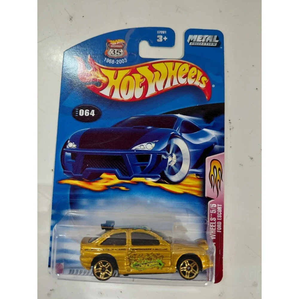NIP Hot Wheels Flamin' Hot 1:64 Die Cast Ford Escort Rally Car